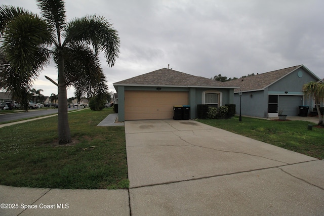 ranch-style house with a garage, driveway, a front yard, and stucco siding