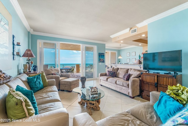 living area featuring recessed lighting, visible vents, crown molding, and light tile patterned floors