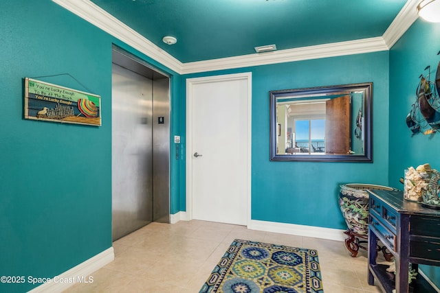 entrance foyer featuring crown molding, light tile patterned floors, baseboards, and elevator