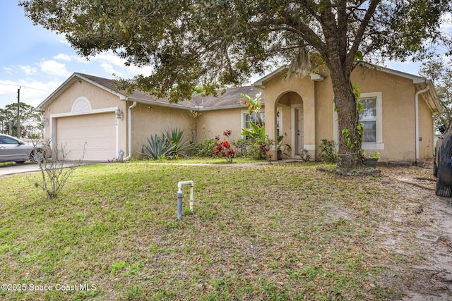 ranch-style house with a garage, a front yard, and stucco siding