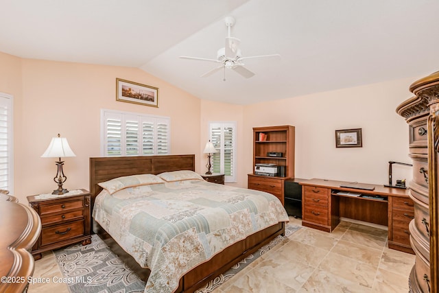 bedroom featuring a ceiling fan and vaulted ceiling