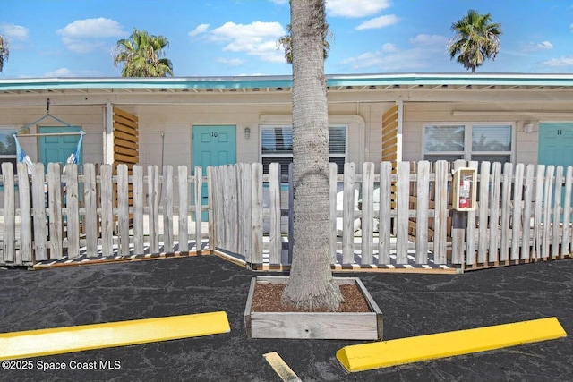 view of front of home with fence