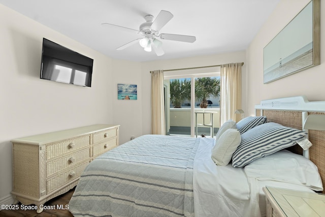 bedroom featuring access to exterior and a ceiling fan