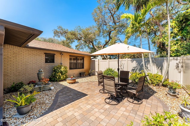 view of patio with a fenced backyard