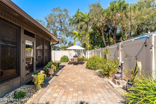 view of patio with a fenced backyard