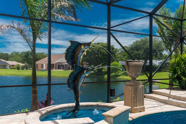 exterior space featuring glass enclosure, a water view, a pool, and an in ground hot tub