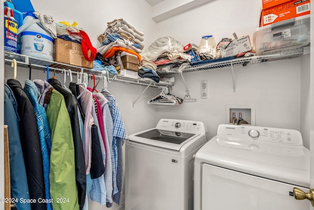 laundry area featuring laundry area and separate washer and dryer