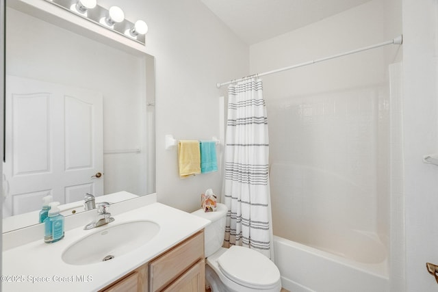 bathroom featuring shower / tub combo, vanity, and toilet