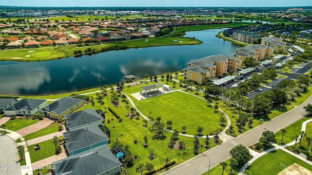 aerial view with a residential view and a water view