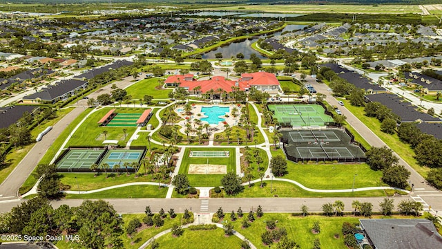 bird's eye view featuring a residential view and a water view