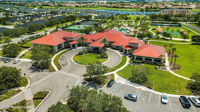 bird's eye view with a water view and a residential view