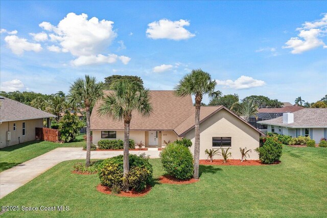 6315 Anchor Ln, Rockledge, FL 32955 - view of front of house featuring driveway and stucco siding