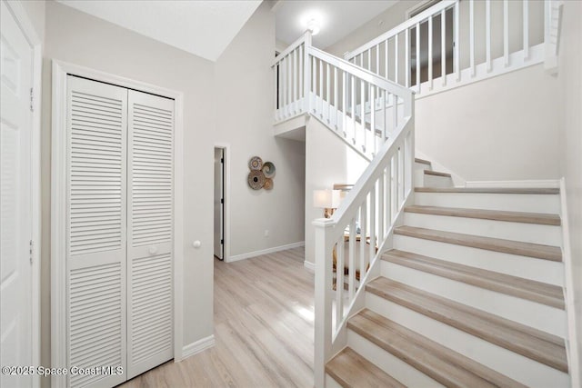 6315 Anchor Ln, Rockledge, FL 32955 - stairway featuring baseboards and wood finished floors
