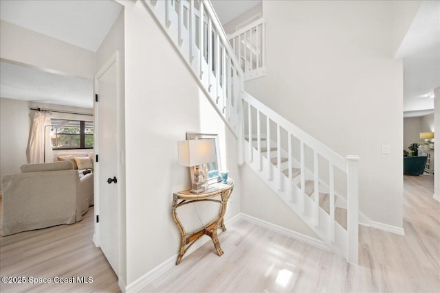 6315 Anchor Ln, Rockledge, FL 32955 - stairway featuring wood finished floors