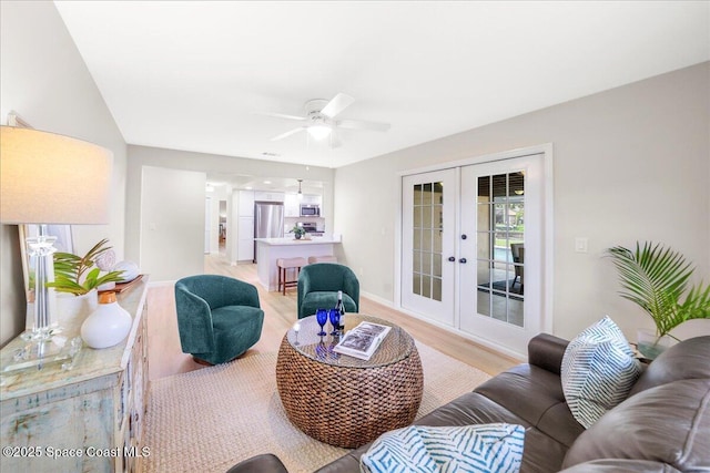 6315 Anchor Ln, Rockledge, FL 32955 - living area with french doors, light wood-style flooring, and ceiling fan