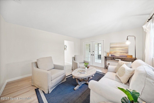 6315 Anchor Ln, Rockledge, FL 32955 - living area with wood finished floors and french doors