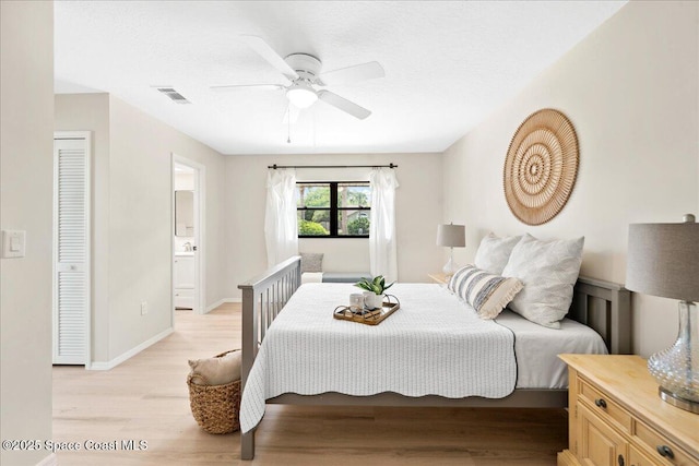 6315 Anchor Ln, Rockledge, FL 32955 - bedroom featuring light wood-type flooring, a ceiling fan, and ensuite bath