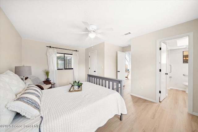 6315 Anchor Ln, Rockledge, FL 32955 - bedroom with light wood-style floors, a ceiling fan, and ensuite bath