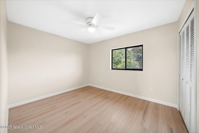 6315 Anchor Ln, Rockledge, FL 32955 - unfurnished bedroom with light wood-style floors, a closet, and a ceiling fan