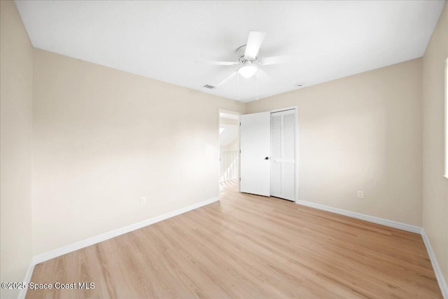 6315 Anchor Ln, Rockledge, FL 32955 - unfurnished bedroom with a closet, light wood-style flooring, and ceiling fan