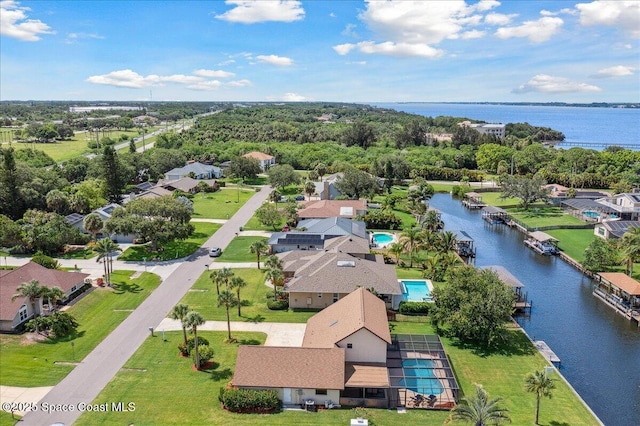 6315 Anchor Ln, Rockledge, FL 32955 - aerial view of residential area featuring a nearby body of water and a pool area