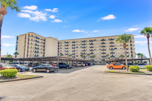 view of property with covered parking