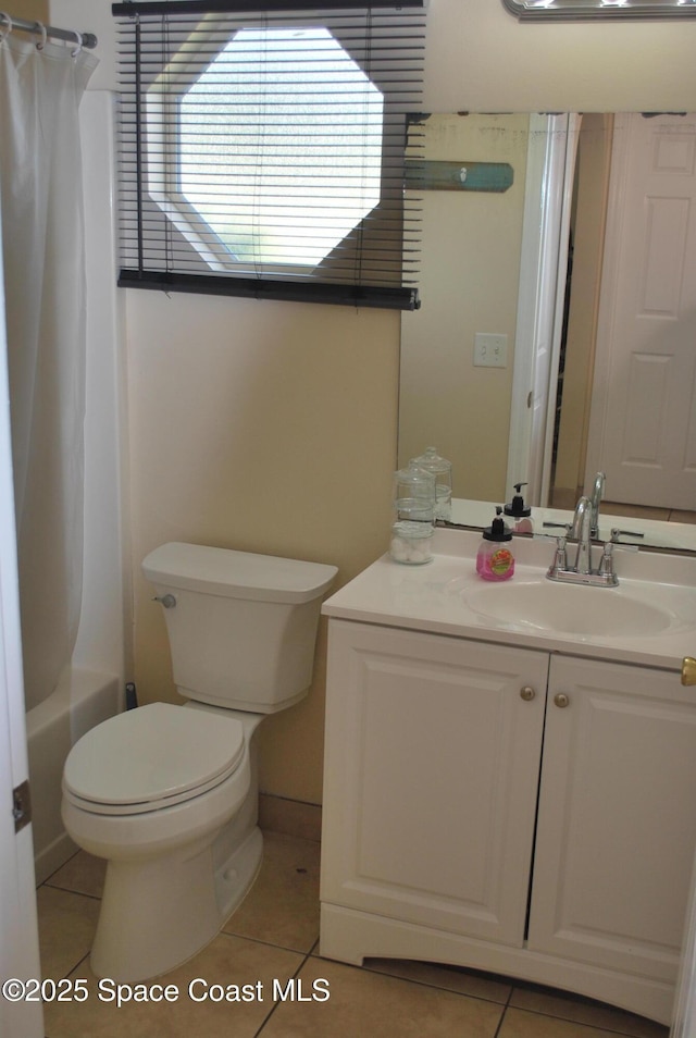full bathroom featuring toilet, shower / tub combo with curtain, tile patterned flooring, and vanity