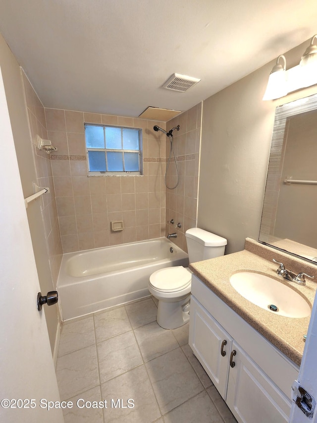 full bath featuring shower / bath combination, visible vents, toilet, tile patterned flooring, and vanity