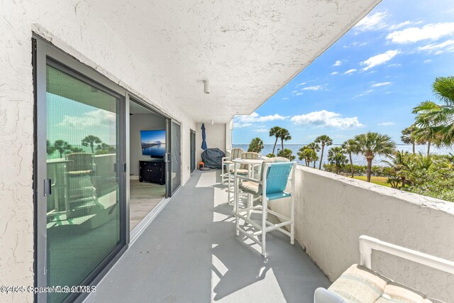 balcony featuring a sunroom