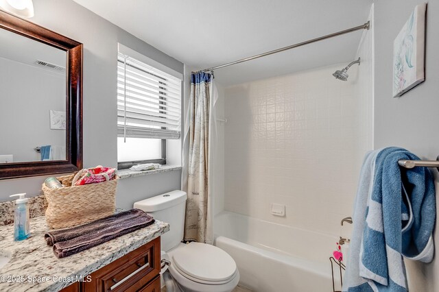 5055 Dixie Hwy NE Unit B206, Palm Bay, FL 32905 - bathroom with vanity, shower / bath combo, and toilet