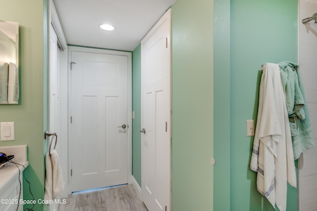 5055 Dixie Hwy NE Unit B206, Palm Bay, FL 32905 - entryway featuring recessed lighting, light wood-style floors, and baseboards