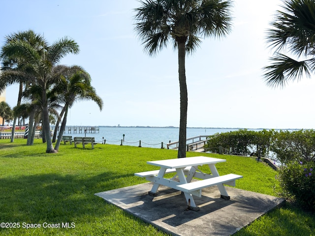 5055 Dixie Hwy NE Unit B206, Palm Bay, FL 32905 - surrounding community with a water view and a yard