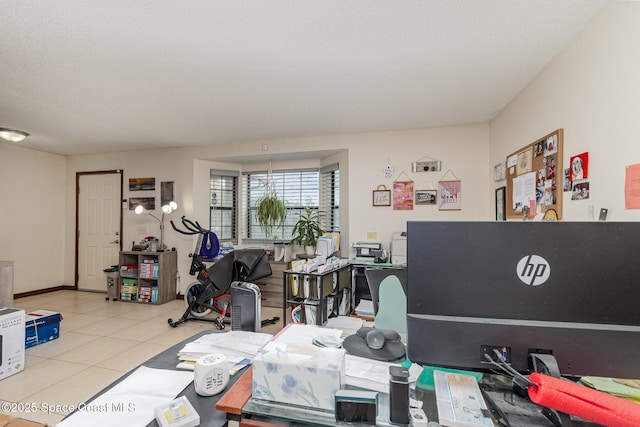 office featuring tile patterned flooring and a textured ceiling