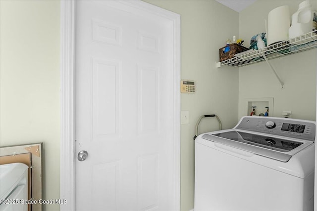 laundry room with washer / clothes dryer and laundry area