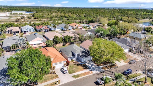 bird's eye view with a view of trees and a residential view