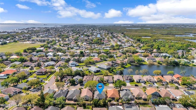 aerial view featuring a residential view and a water view