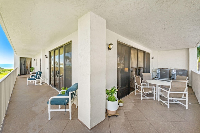 view of patio / terrace featuring a balcony