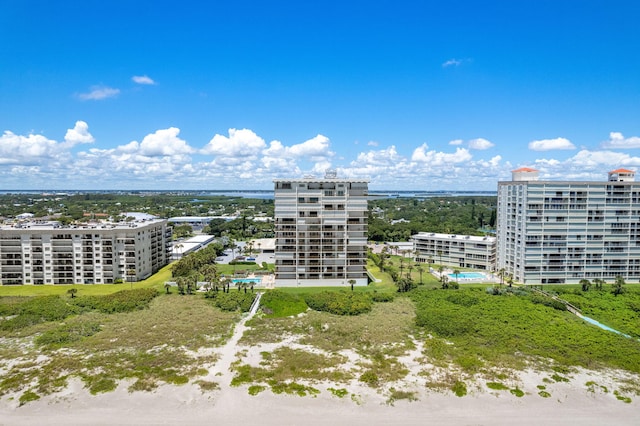 drone / aerial view featuring a city view