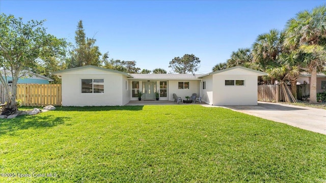 single story home featuring fence, driveway, and stucco siding