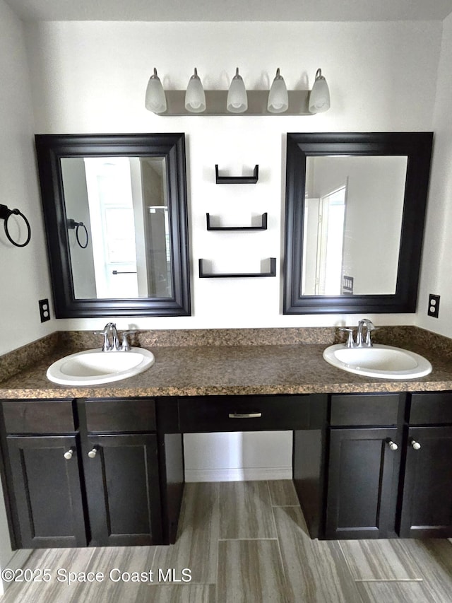 bathroom with double vanity and a sink