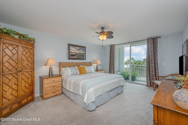 bedroom featuring light carpet, a ceiling fan, and access to exterior