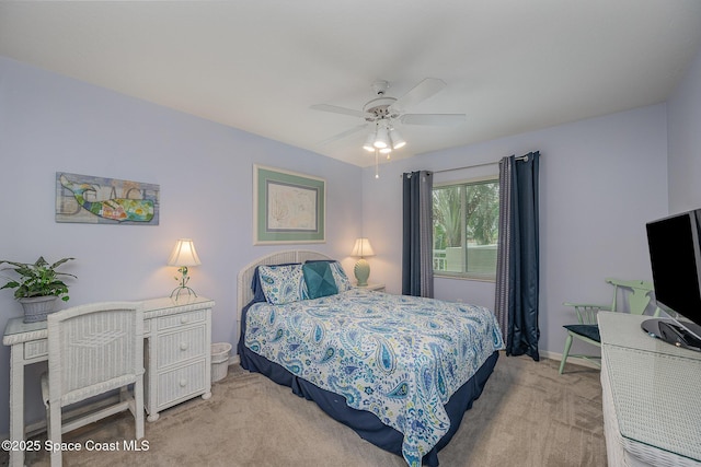 bedroom with carpet flooring, ceiling fan, and baseboards