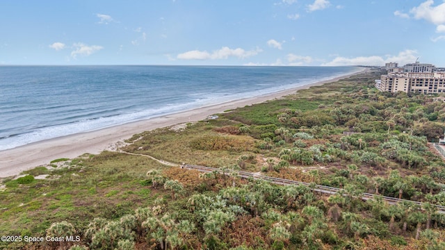 aerial view featuring a water view and a beach view