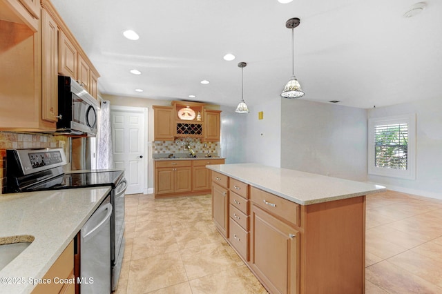 kitchen featuring a center island, decorative light fixtures, stainless steel appliances, decorative backsplash, and light stone countertops