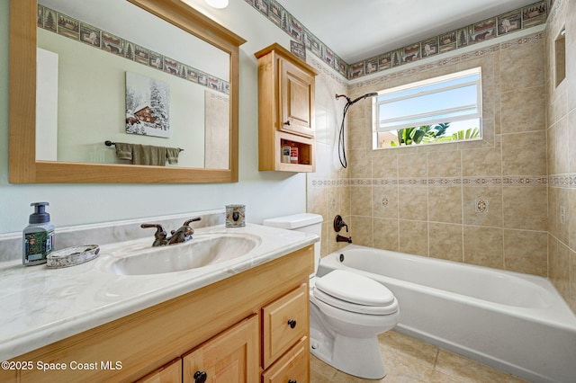 full bath featuring washtub / shower combination, vanity, toilet, and tile patterned floors