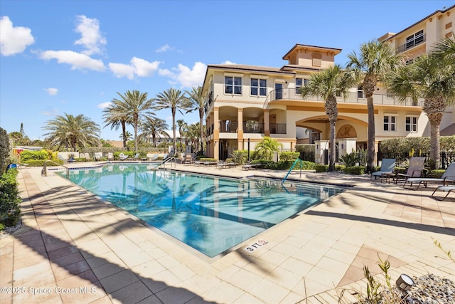 pool with a patio