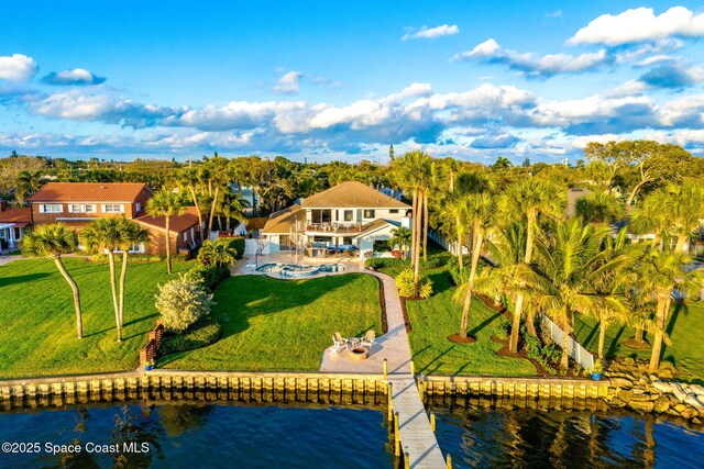 drone / aerial view featuring a water view