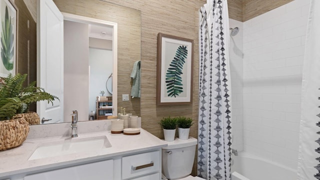 bathroom with toilet, shower / tub combo, and vanity