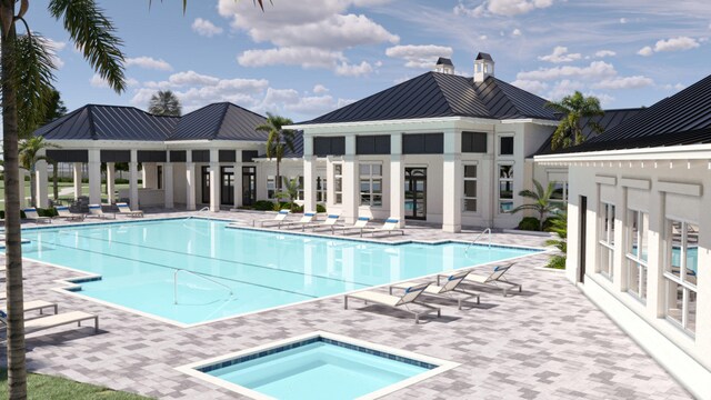 community pool featuring a community hot tub and a patio area