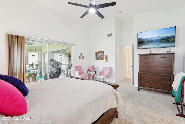 bedroom featuring visible vents, carpet flooring, ceiling fan, high vaulted ceiling, and access to outside